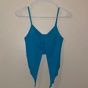 Blue cropped camisole with V-shaped hem